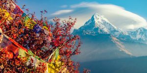 mountain covered with snow under cloudy sky